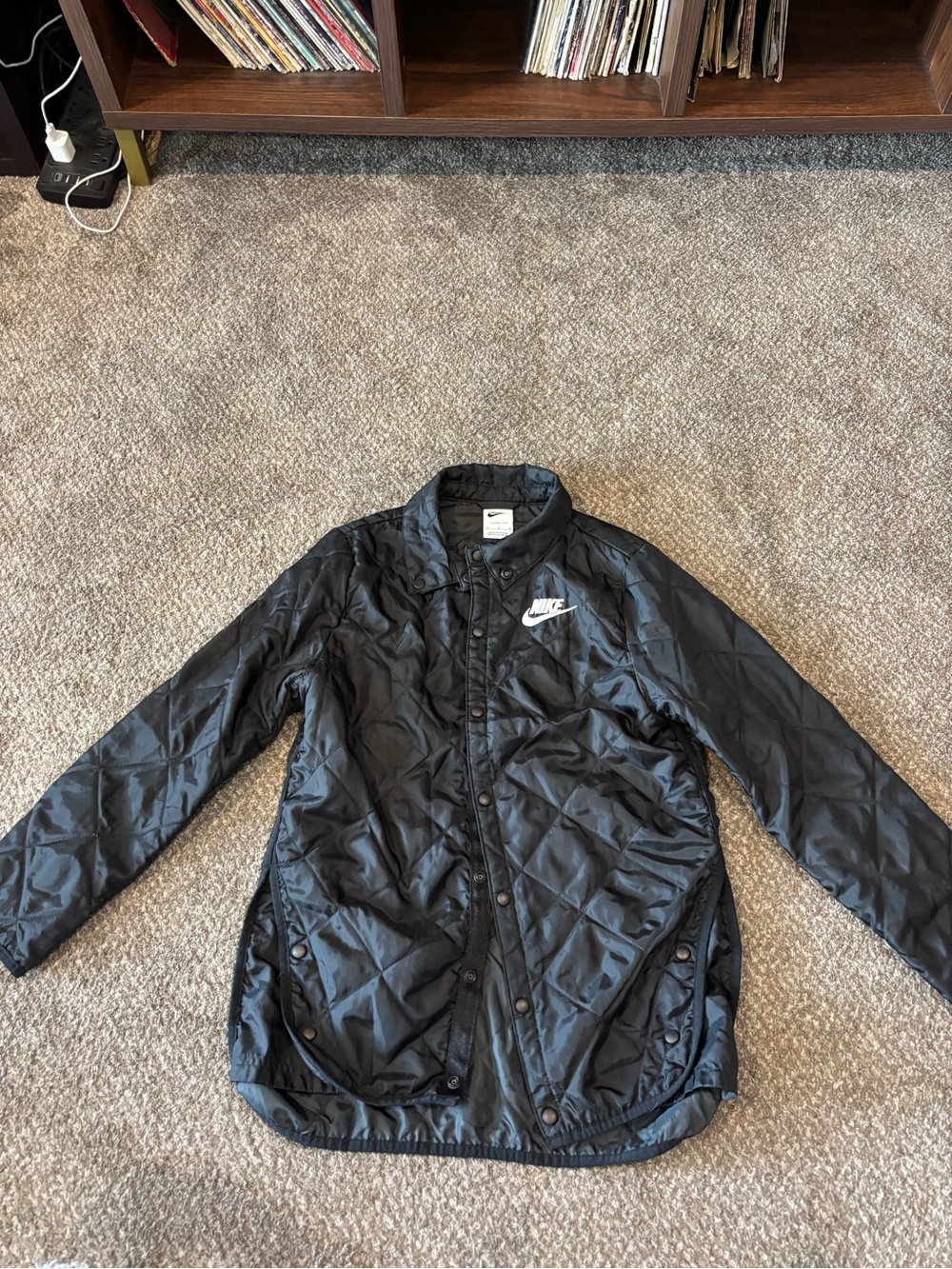 Nike Black Quilted Puff Jacket with White Swoosh Logo